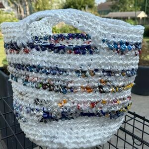 Handmade from repurposed plastic bags crocheted shopping basket laundry tote